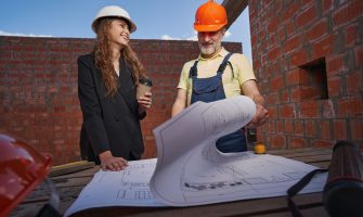 joyful-woman-smiling-at-worker-during-bluepring-ex-2023-11-27-05-10-52-utc.jpg